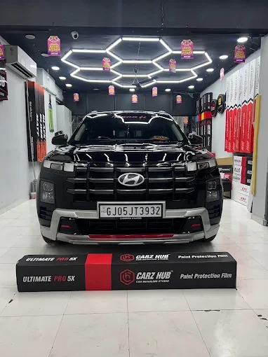 Black Hyundai at Carz Hub with Carz Hub paint protection film boxes in front